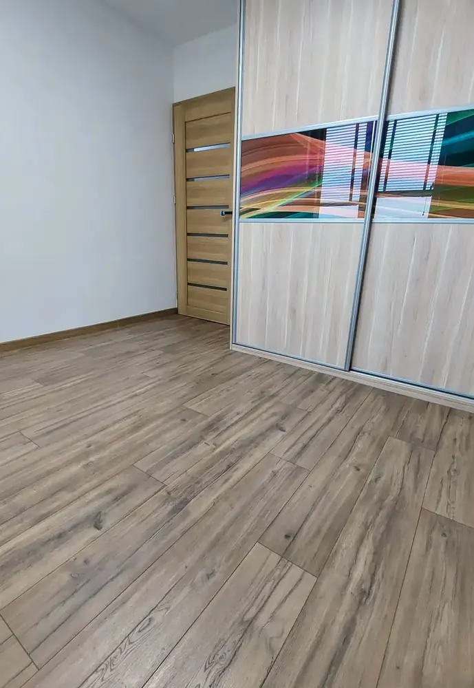 Panele laminowane Swiss Krono Dąb Munari AC5 po montażu w mieszkaniu w Sosnowcu